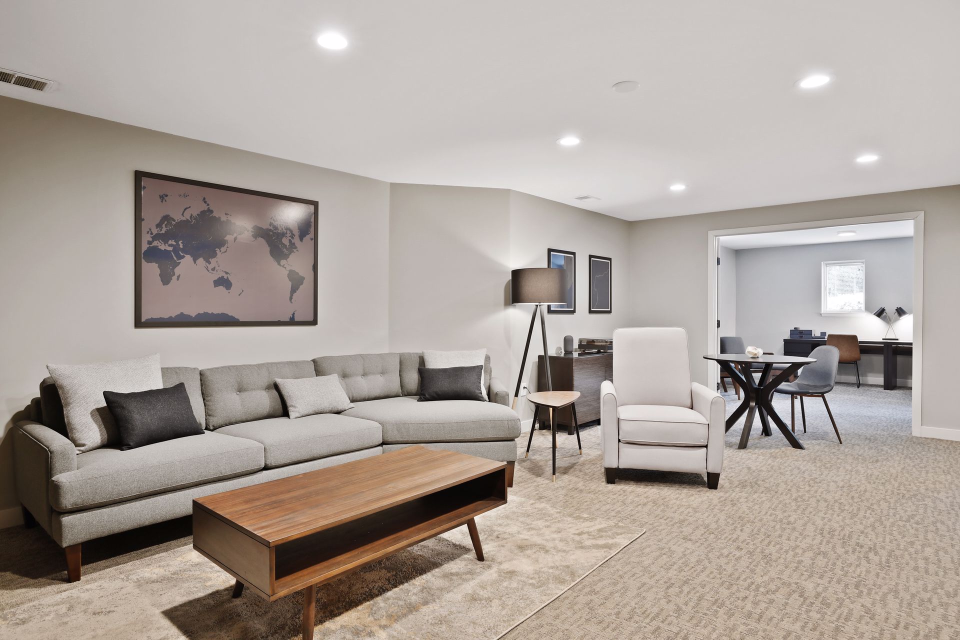 alternative view of entertainment room with view into office